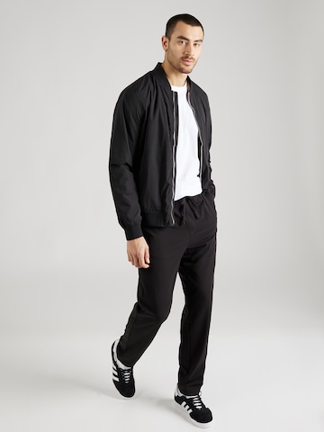 ABOUT YOU x Kevin Trapp Between-Season Jacket 'Robin' in Black