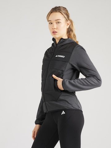 ADIDAS TERREX - Chaqueta de montaña en negro: frente