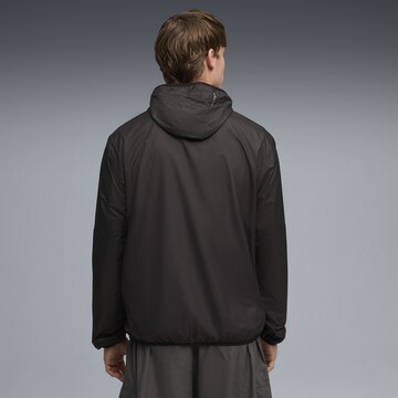 PUMA Jacke in Schwarz