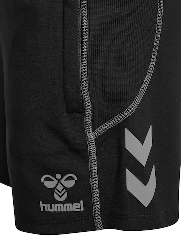 Hummel Regular Sports trousers in Black