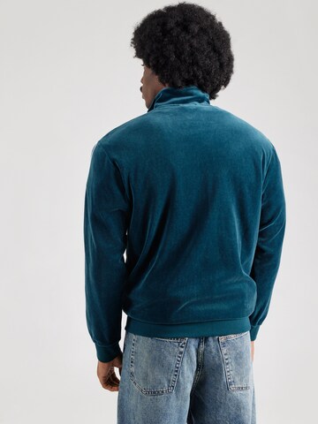 Veste de survêtement 'ESS' PUMA en vert