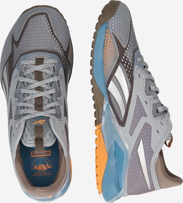 Scarpa da corsa 'Nano X2 TR Adventure' di Reebok in grigio