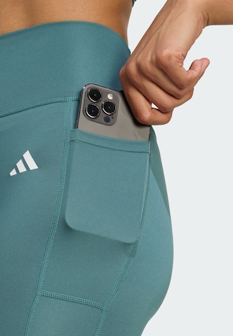 ADIDAS PERFORMANCE Skinny Fit Спортен панталон 'Optime Power Essentials' в зелено