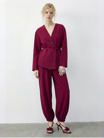 Completo pantalone di Bianco Lucci in rosa