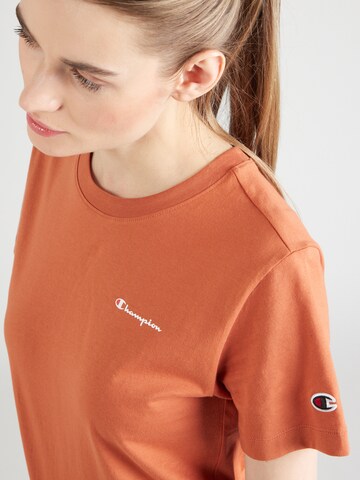 Champion Authentic Athletic Apparel T-Shirt in Orange