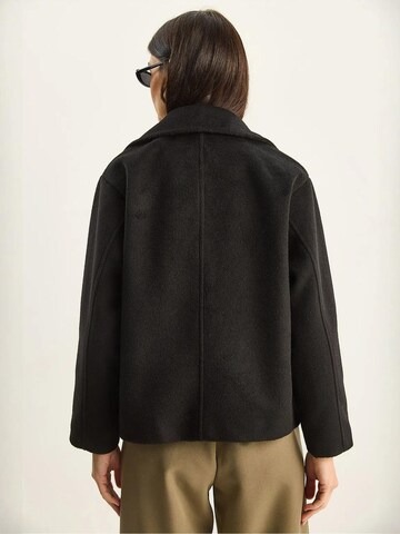 Bianco Lucci Mäntel in Schwarz