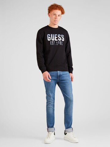 Bluză de molton de la GUESS pe negru