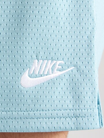 Regular Pantaloni 'CLUB FLOW' de la Nike Sportswear pe albastru