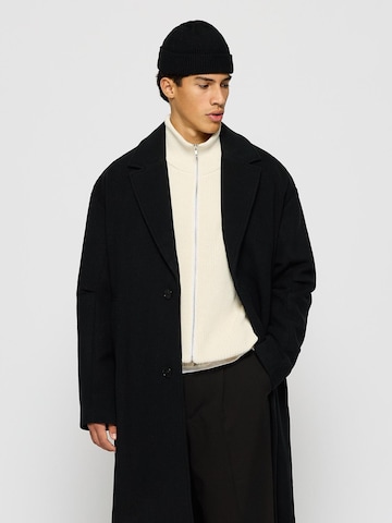 Burocs Between-Seasons Coat in Black: front