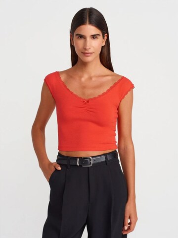 Dilvin - Blusa em laranja: frente