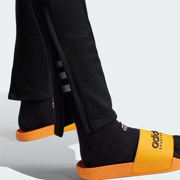 ADIDAS SPORTSWEAR Tapered Sports trousers 'Tiro' in Black