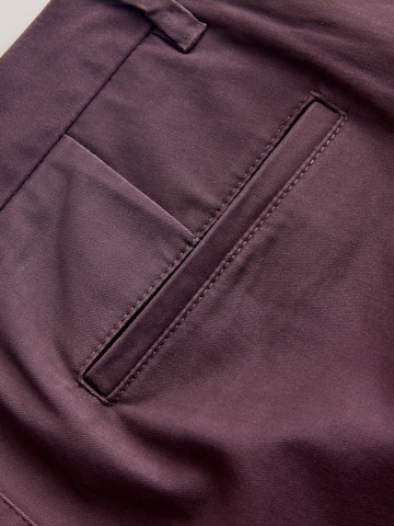 Slimfit Pantaloni chino di Next in marrone