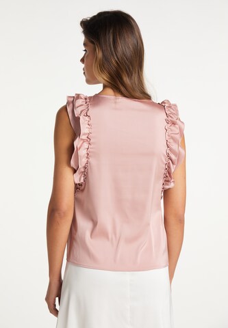 Top di faina in rosa