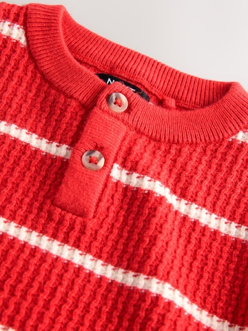 Next Svetr – červená