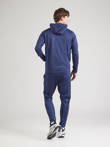 Survêtement 'Novelty' UNDER ARMOUR en bleu
