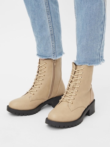 Bianco Lace-Up Ankle Boots in Beige: front
