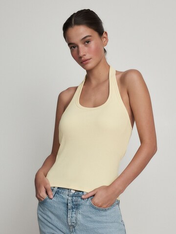 Next - Top en amarillo: frente