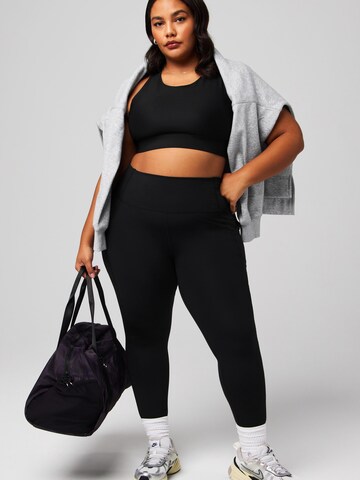 Fabletics Skinny Sportnadrágok 'Oasis' - fekete