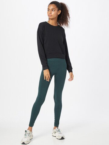 Hummel Skinny Sportbroek in Groen