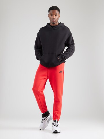 ADIDAS SPORTSWEAR Конический (Tapered) Спортивные штаны 'FI' в Красный