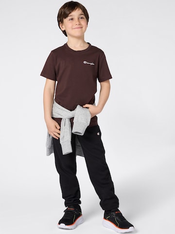 Tapered Pantaloni di Champion Authentic Athletic Apparel in nero