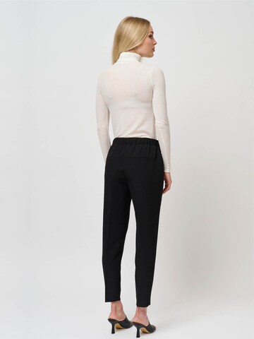 BRUUNS BAZAAR Tapered Trousers with creases 'RubySus Livia' in Black