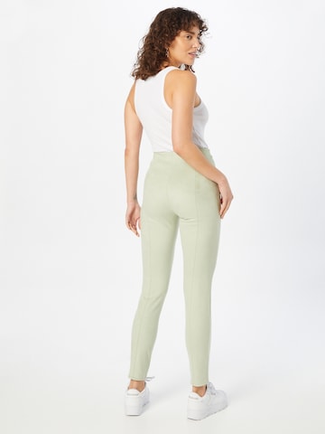GUESS Skinny Spodnie 'Maya' w kolorze zielony