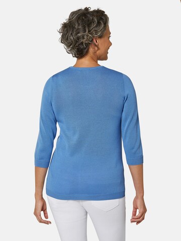 Goldner Pullover in Blau