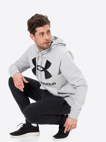 Effilé Pantalon de sport 'Rival' UNDER ARMOUR en noir