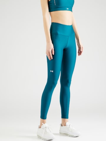 UNDER ARMOUR Skinny Workout Pants in Green: front