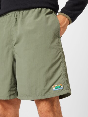 HUF Regular Trousers 'NEW DAY EASY' in Green