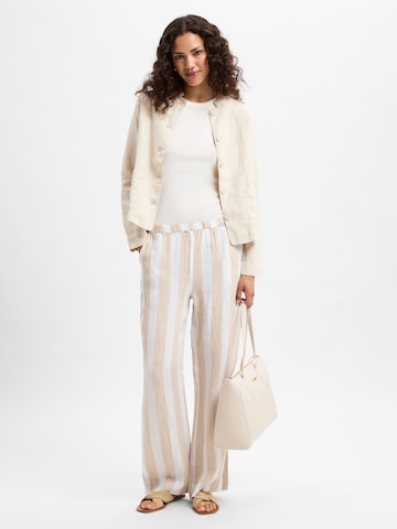 Ipuri Flared Pleat-front trousers in Beige