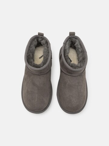 Bocanci de zăpadă 'CLASSIC ULTRA MINI' de la UGG pe gri