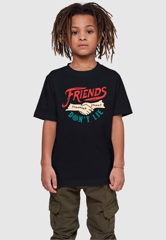 ABSOLUTE CULT Shirt 'Stranger Things - Friends Dont Lie Hands' in Black: front