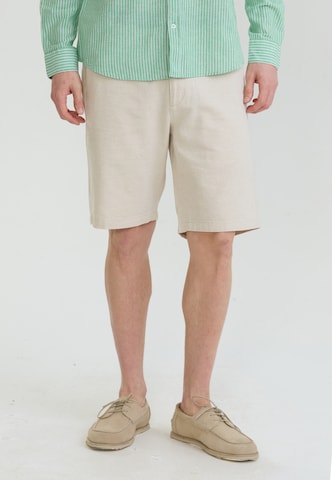 Felix Hardy Slim fit Trousers in Bronze: front