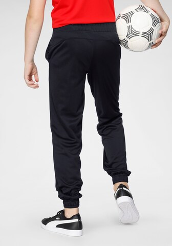 PUMA - Tapered Pantalón en negro