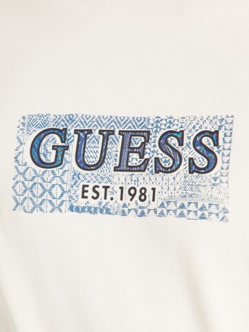 Maglietta di GUESS in beige