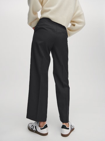 ABOUT YOU x Marie von Behrens Wide leg Trousers 'Philine' in Grey