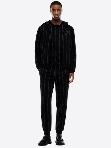 Maglietta di EA7 Emporio Armani in nero