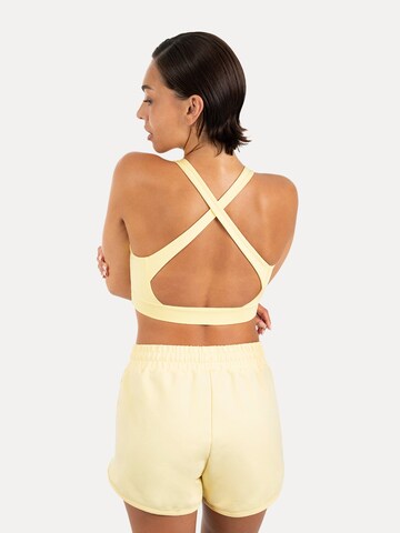 Haut de sport ' Sorea ' Smilodox en jaune