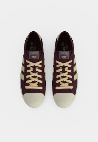 ADIDAS ORIGINALS Låg sneaker 'NISI' i brun