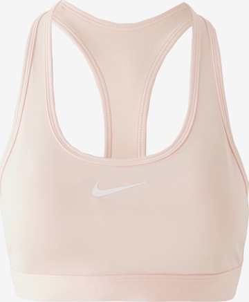 NIKE - Sujetador deportivo 'Swoosh' en rosa: frente