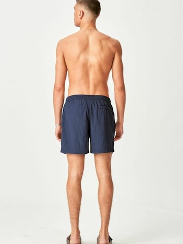 Shorts de bain ' Premium Badeshorts ' TEESHOPPEN en bleu