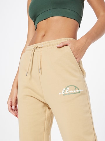 ELLESSE Tapered Broek 'Jeva' in Bruin