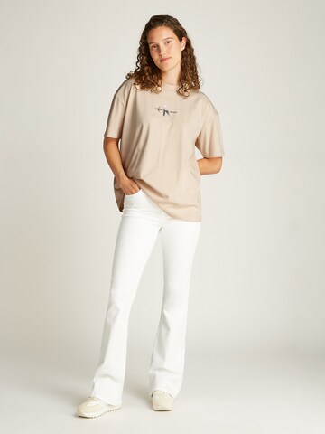 Maglietta di Calvin Klein Jeans in beige