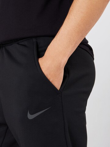 NIKE Tapered Sportsbukser i sort