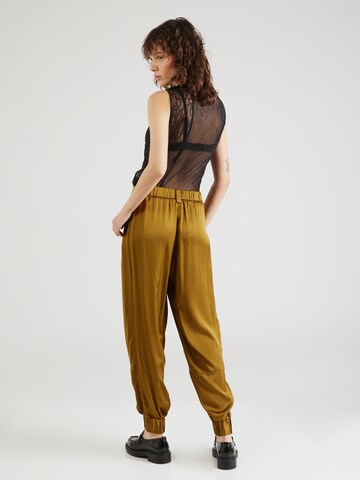 Masai Tapered Pleat-Front Pants 'Pali' in Brown