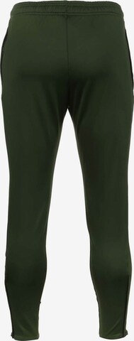 NIKE Slim fit Workout Pants in Green