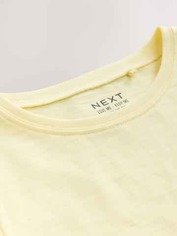 Tricou de la Next pe galben