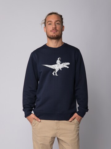 Watapparel Sweatshirt ' Astronaut on T-Rex ' in Blauw: voorkant